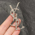 YSL Crystal Monogram Silver Brooch