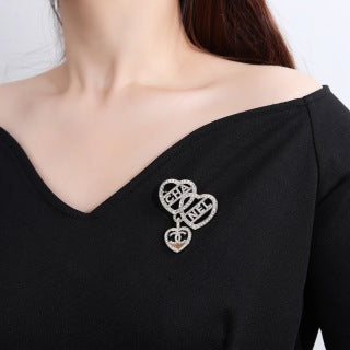 CHANEL Lucienne Heart Emblem Statement Brooch